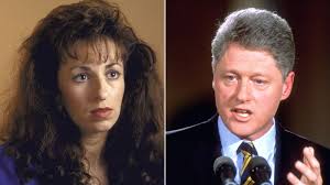 Bill Clinton settles Paula Jones sexual harassment lawsuit.